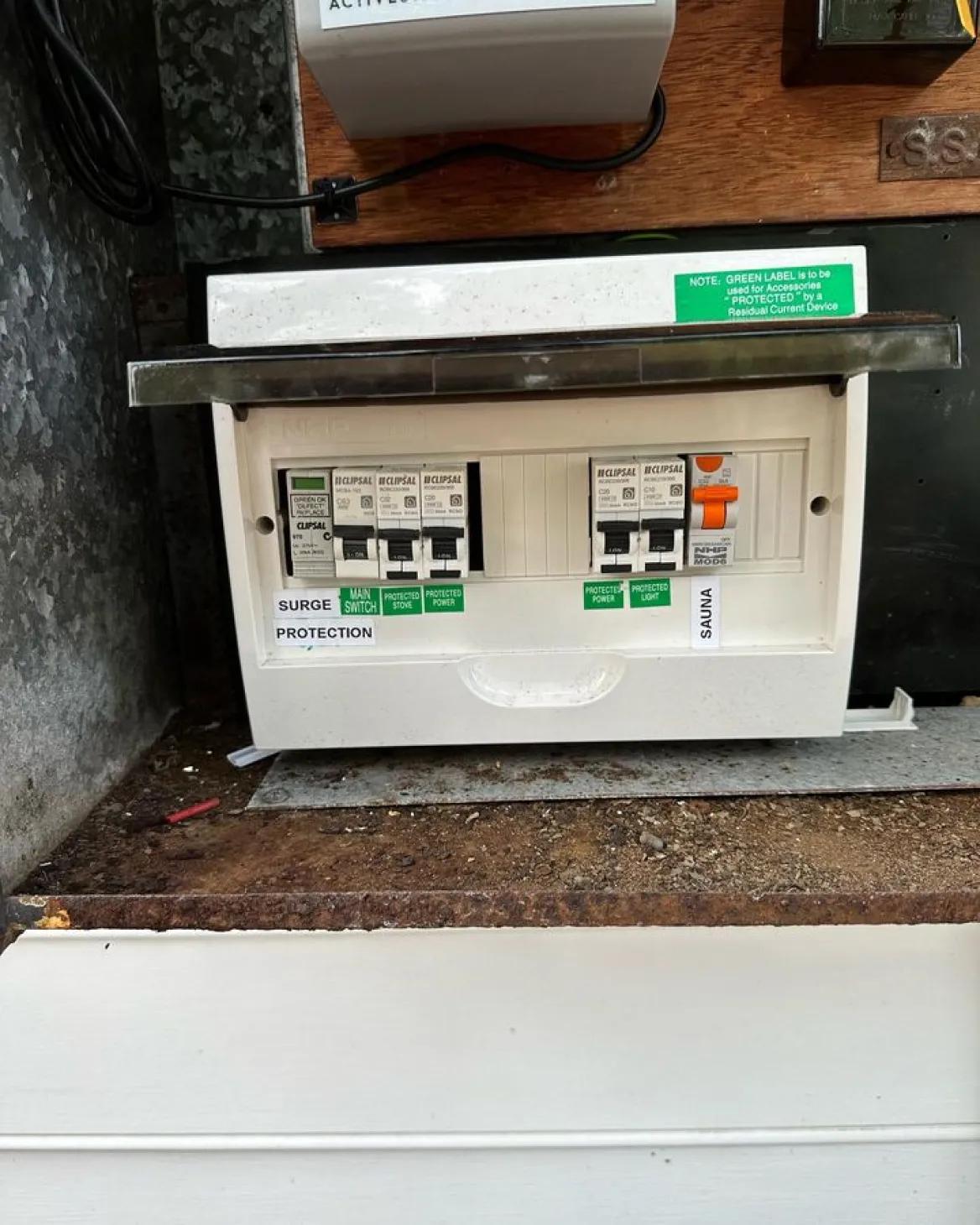 Residential surge protection switchboard installed with circuit breakers for power and lighting